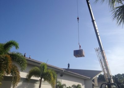Loading Shingles on Church Sanctuary Roof in Palm Bay Florida 32907