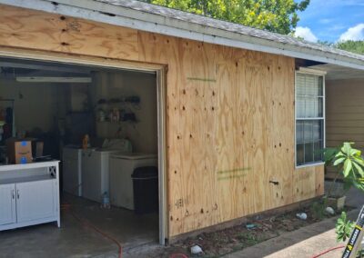 Damaged wood Behind Siding